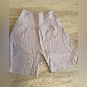 Alphalete Mauve High-Rise Bike Shorts